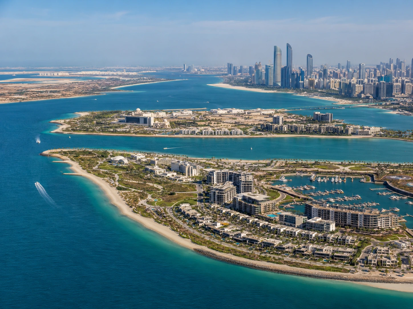 Abu Dhabi skyline with premium residential towers and waterfront communities, where leading developers Aldar, Modon, and Eagle Hills are shaping the capital's property market.